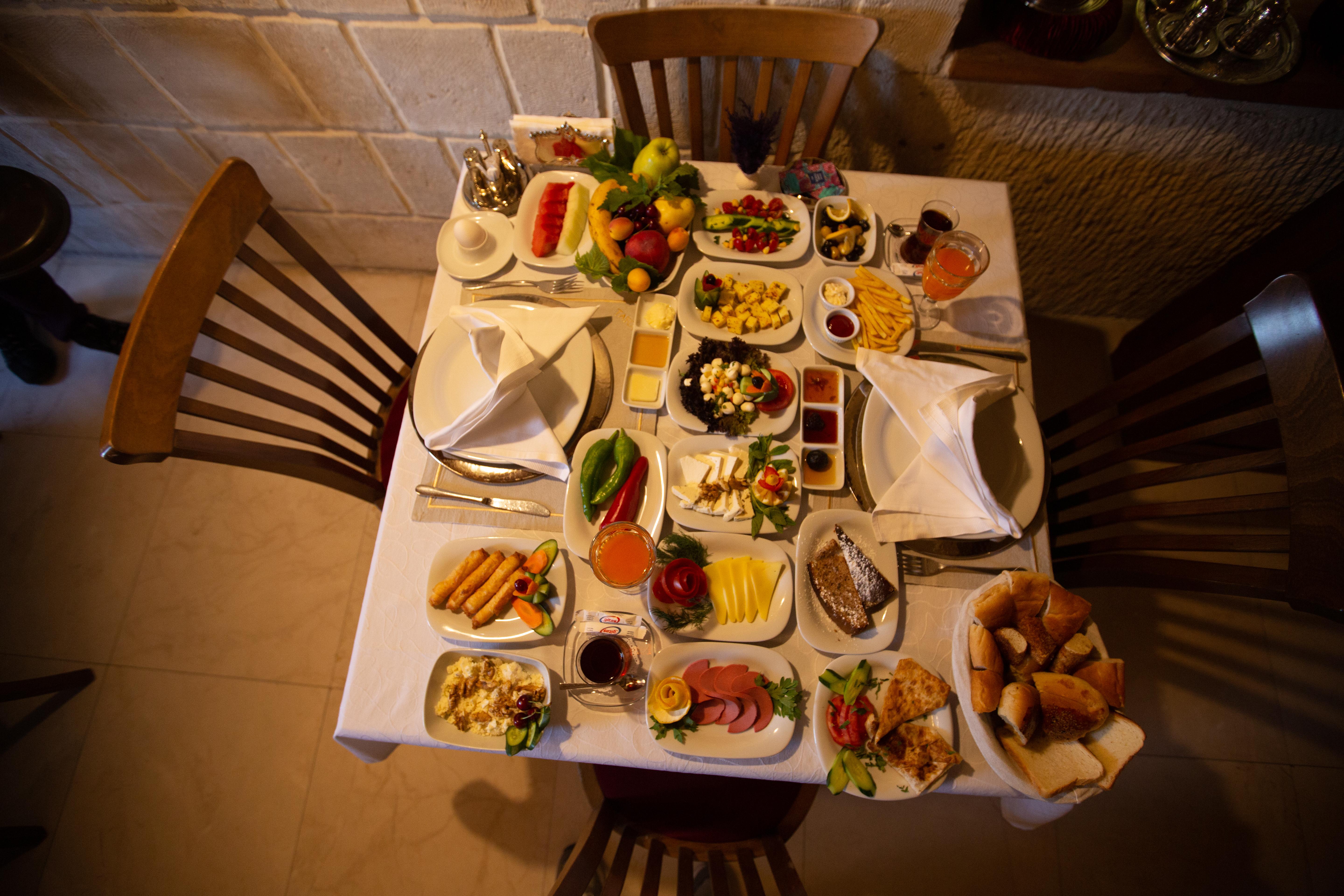 Ortahisar Tafoni Houses Cave Hotel מראה חיצוני תמונה